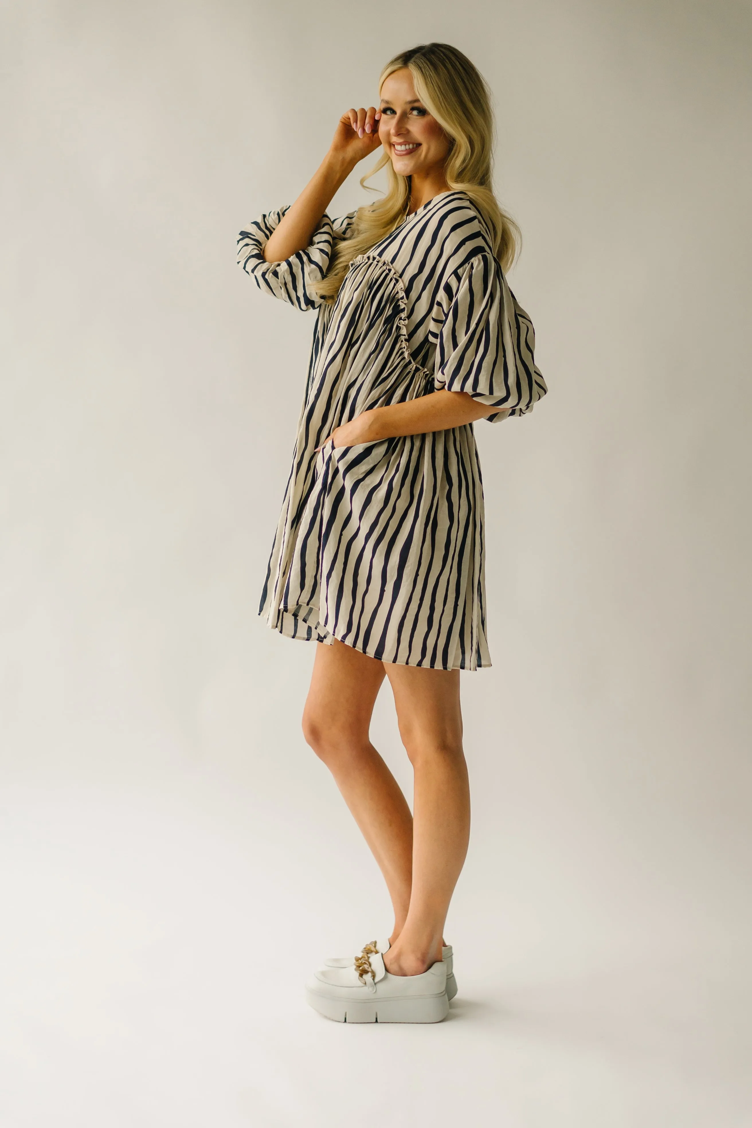 The Pampa Bubble Sleeve Babydoll Dress in Navy Stripe